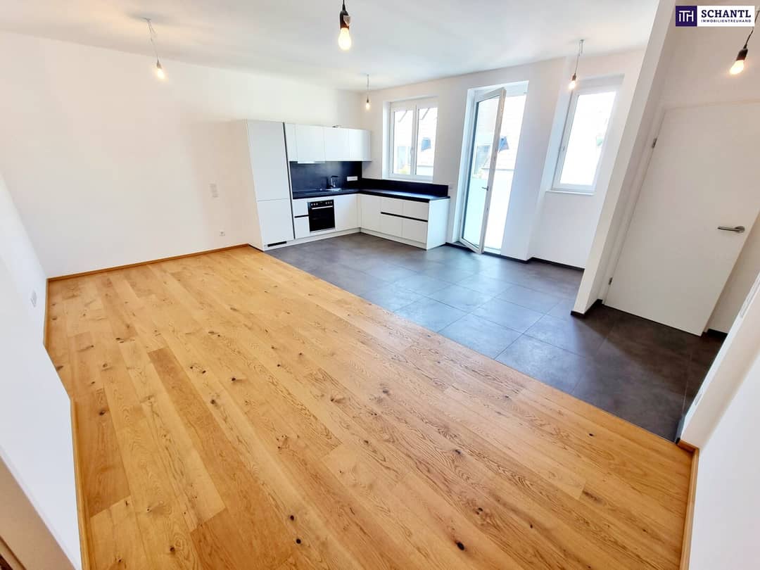 Dachgeschosswohnung mit Balkonblick auf den Innenhof