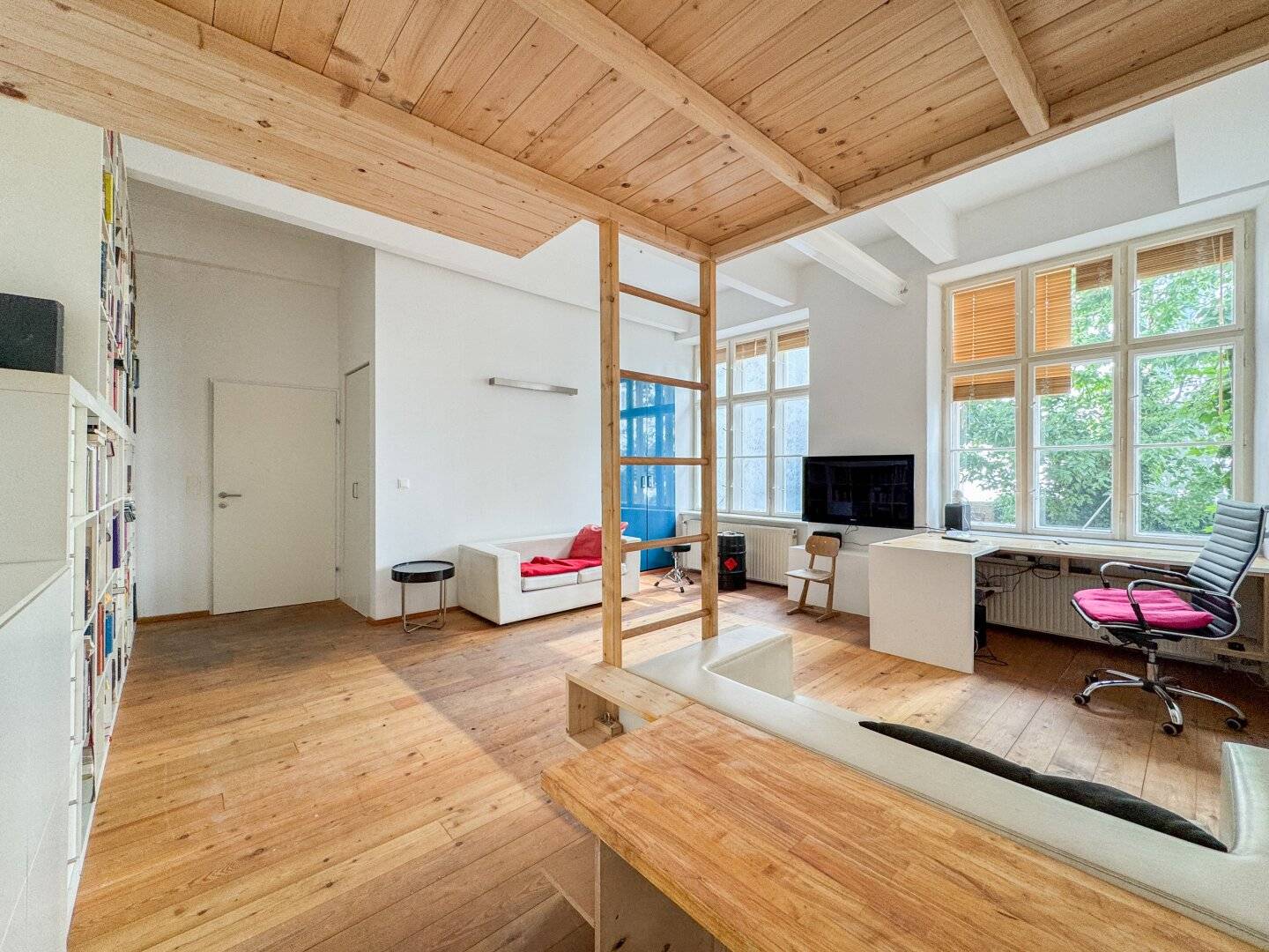 Loft apartment in the quiet courtyard of an art nouveau building with bright living space