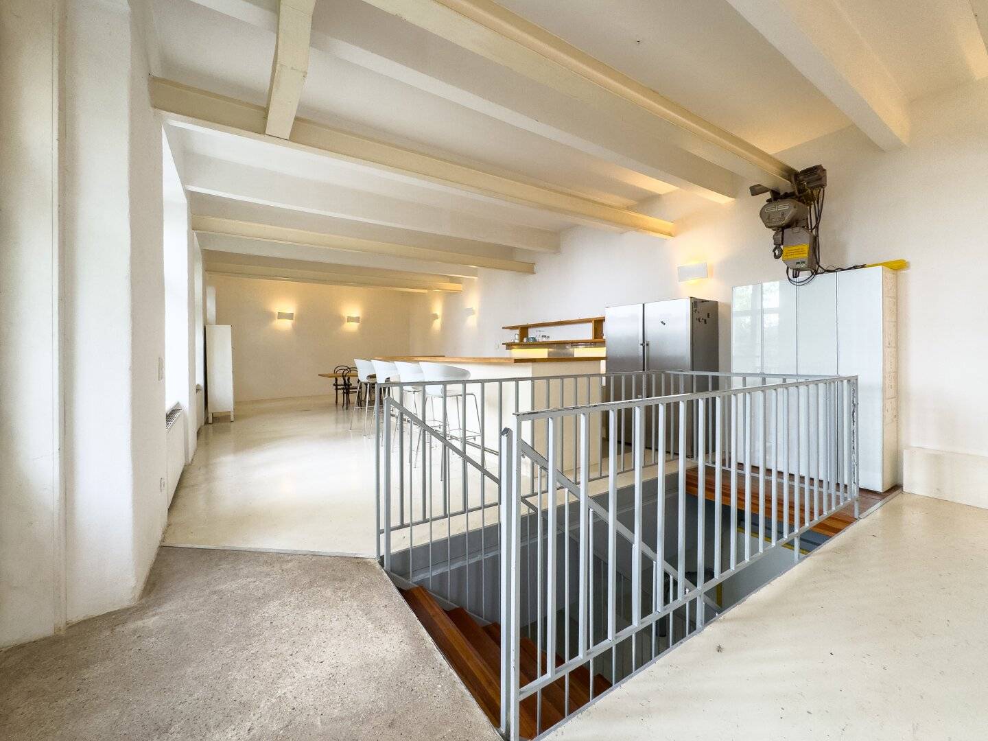 Loft apartment in the quiet courtyard of an art nouveau building with bright living space