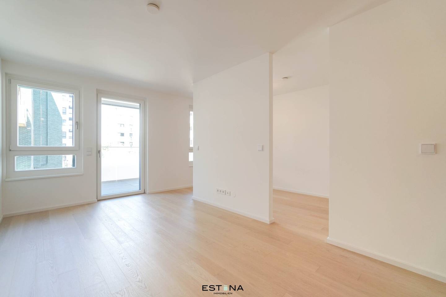 Neubauwohnung mit Balkon und Gartenblick