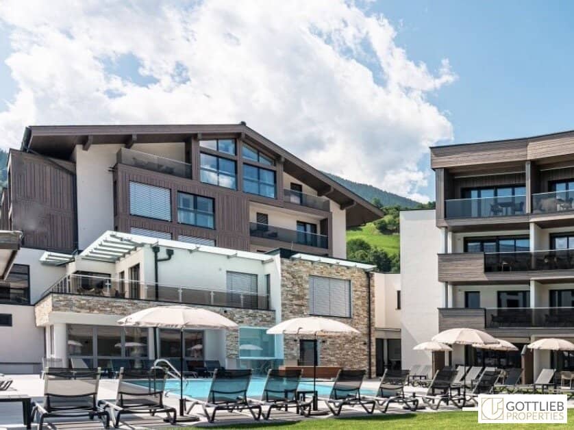 Bestlage Pinzgau mit ca. 6% Rendite! Sieben Apartments mit Terrassen, Balkonen und beheiztem Aussenpool