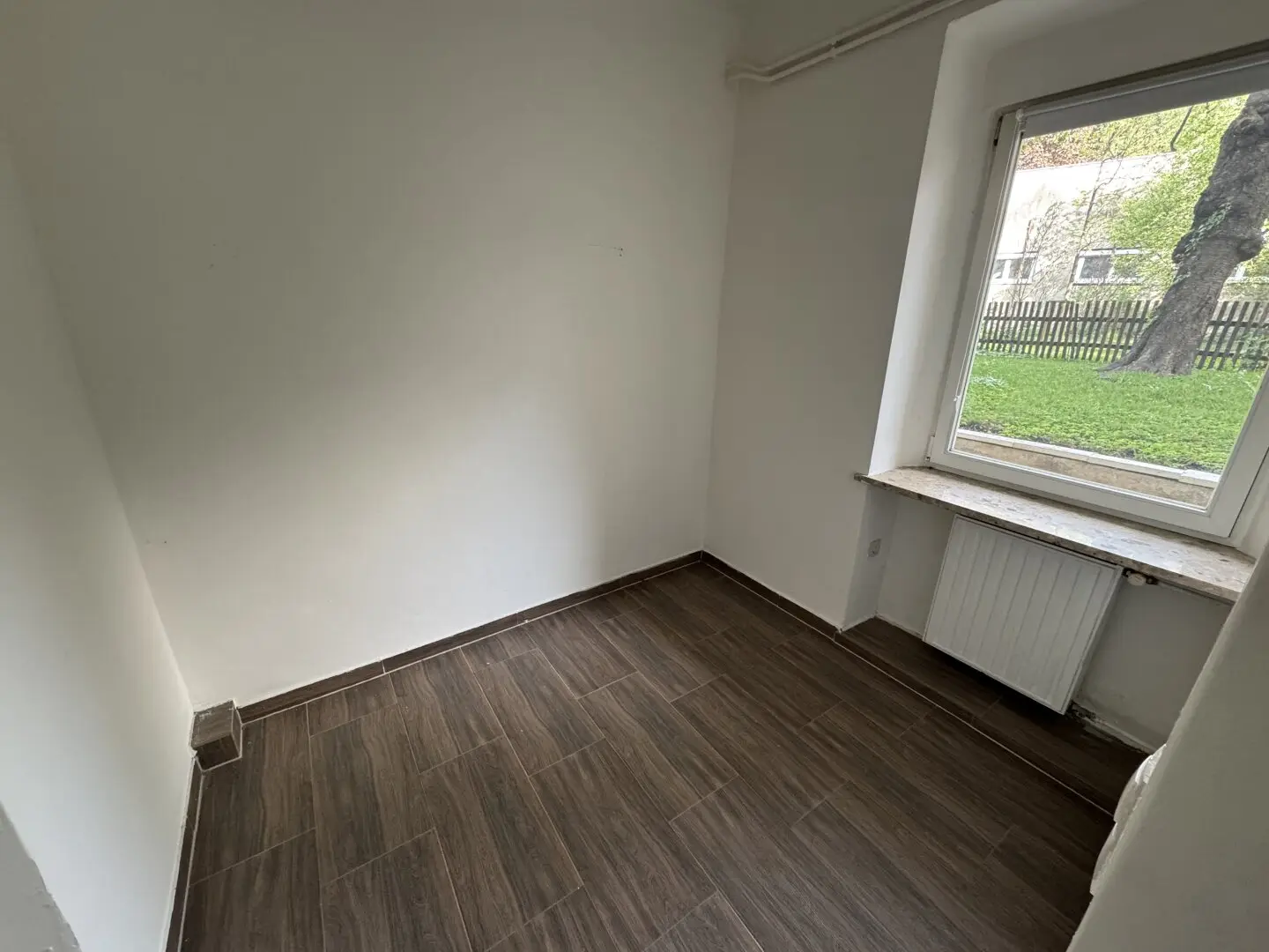 Quiet one room apartment on the ground floor with a view of the green inner courtyard