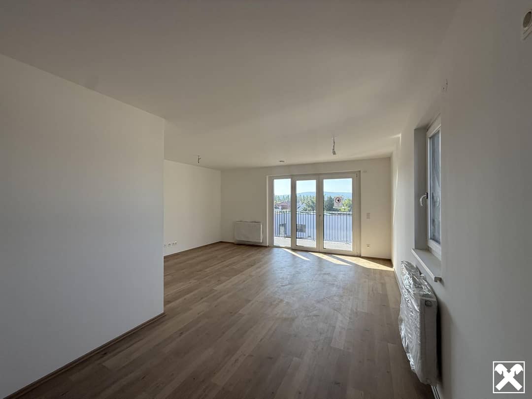 Wohnung im Neubauquartier mit Balkon und Grün