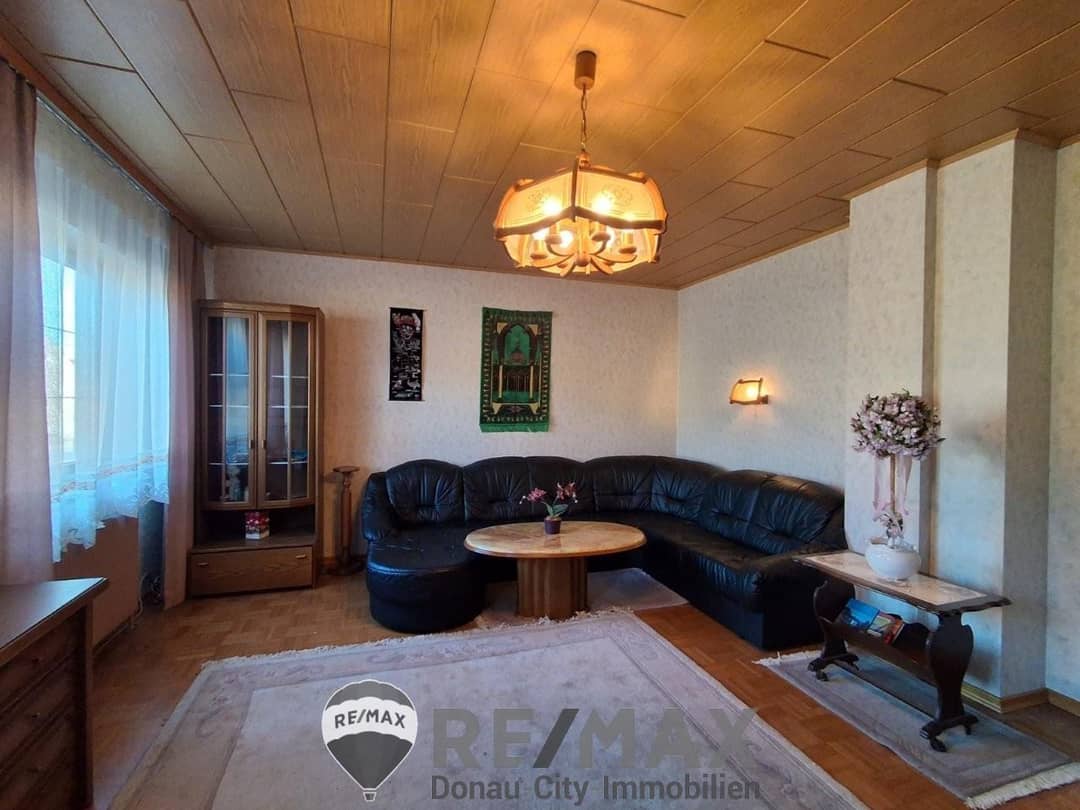 Mehrfamilienhaus Moosbrunn Zentrum – 2 Häuser mit Garten am Fluss