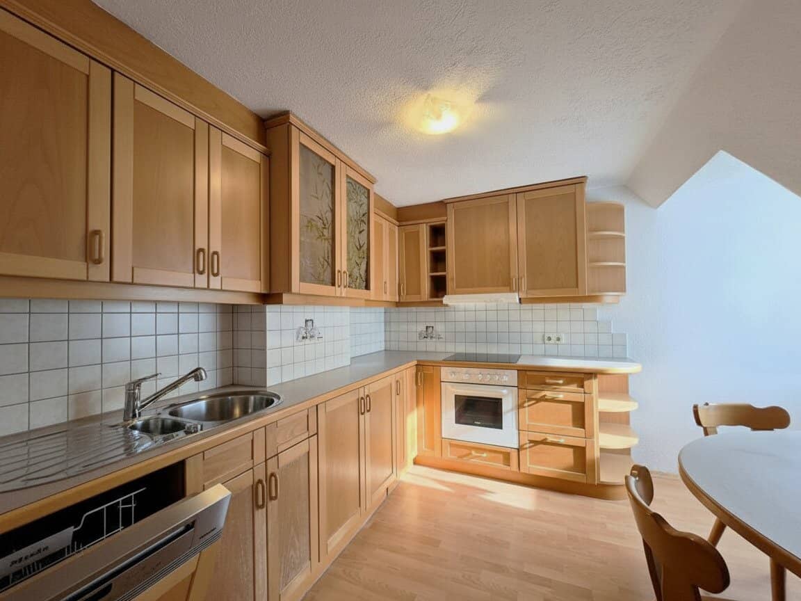 Attic apartment with fireplace and kitchen