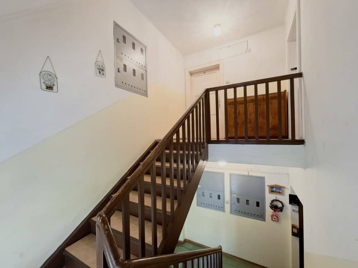 Attic apartment with fireplace and kitchen