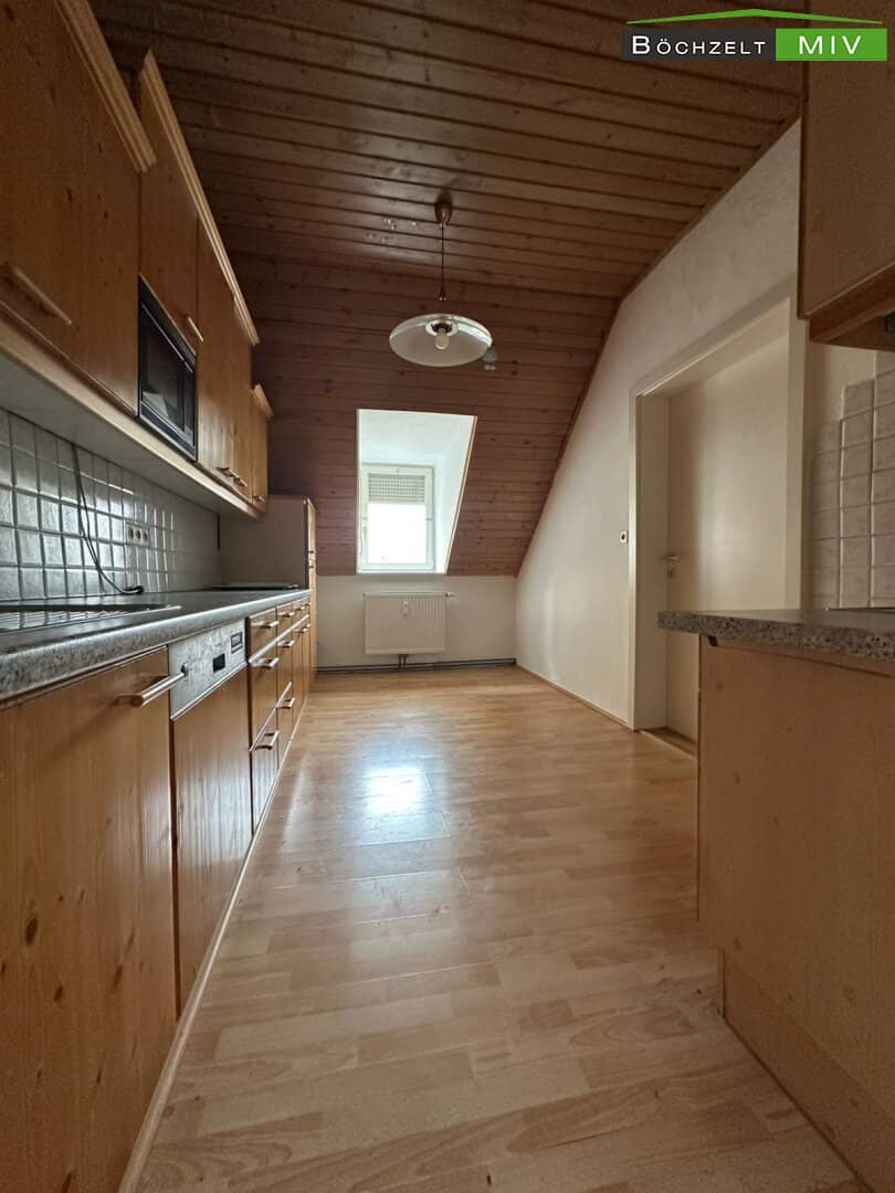 Attic apartment near the city center with a furnished kitchen