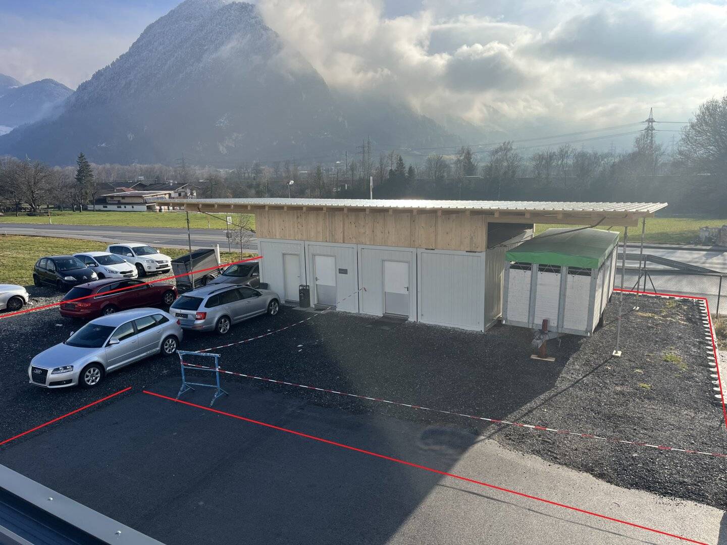 Storage space / car dealership, approx 460 m² to 700 m², partly covered outdoor area with 2 double containers and excellent highway access to Wiesing Autobahn on-ramp? No trailing punctuation? But we must provide text.