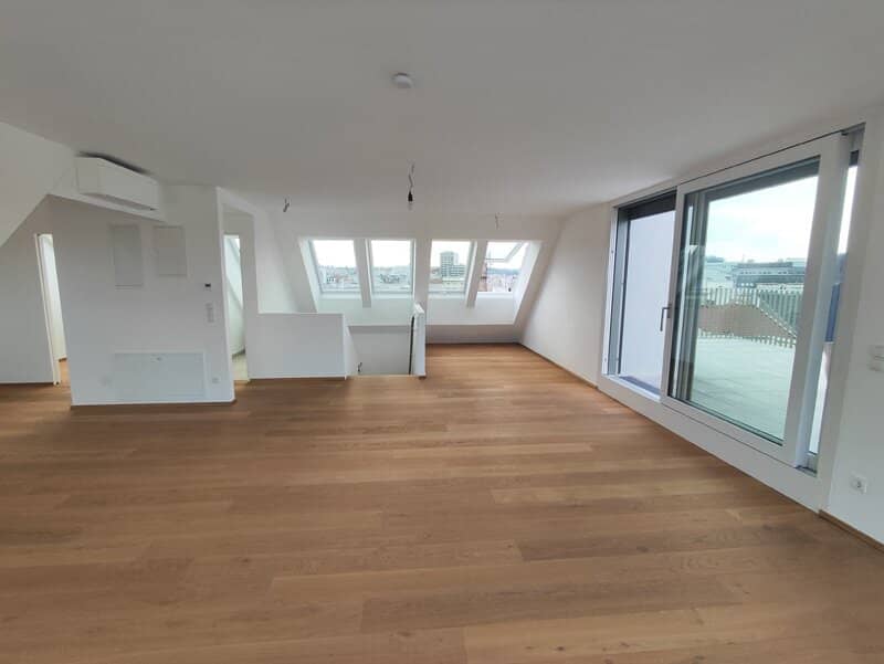 Sunny first-occupancy top-floor maisonette apartment with large terrace and distant view - Top72