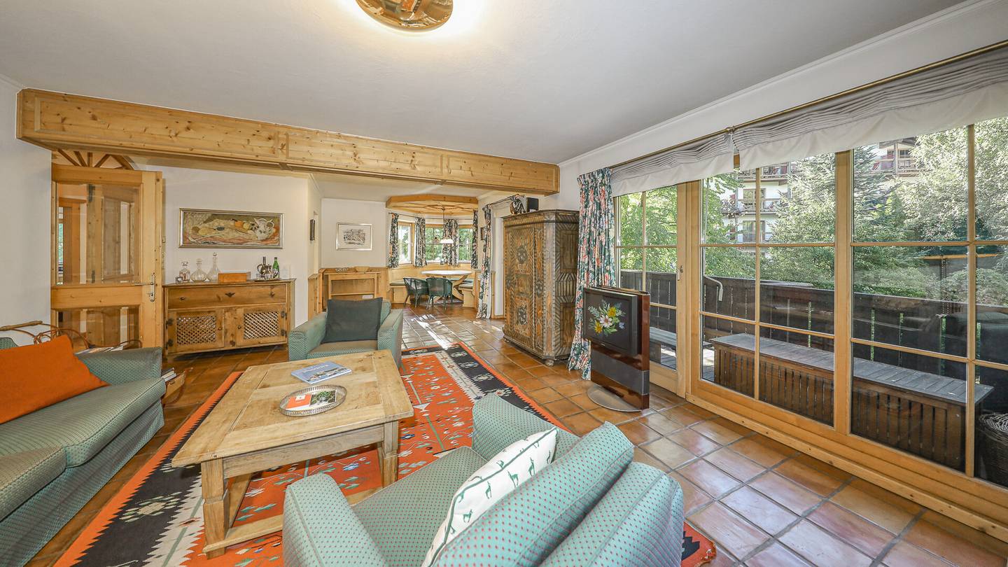 apartment in green setting generous living room