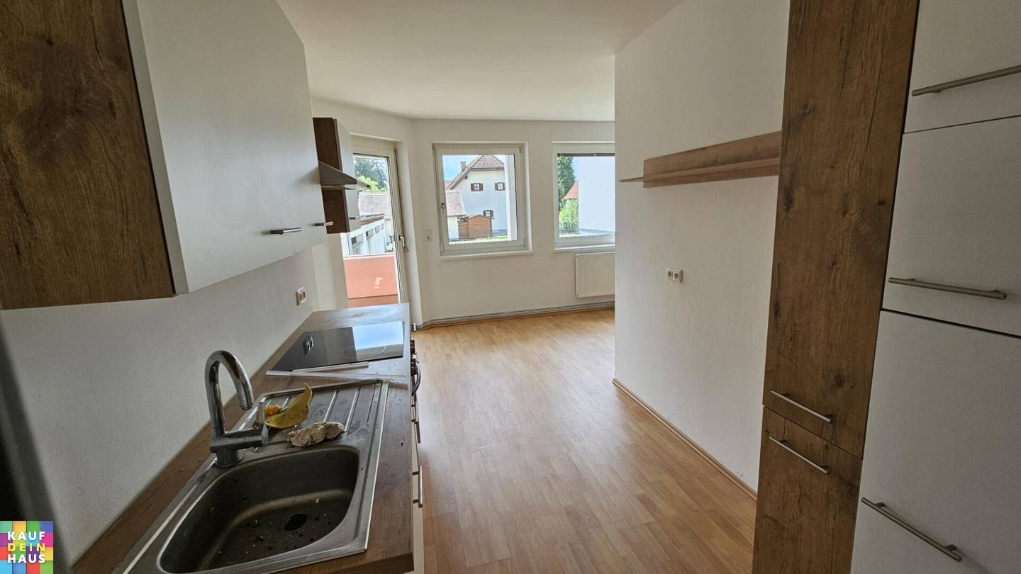 Spacious apartment with balcony and carport
