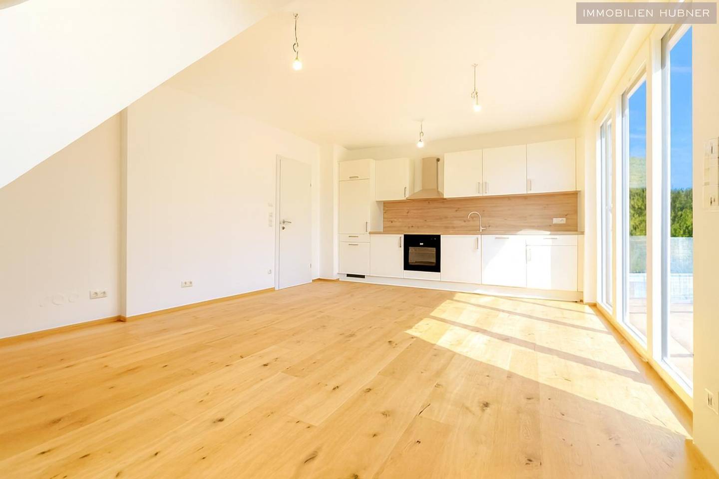 Top floor apartment newly built with two terraces and excellent public transport connections