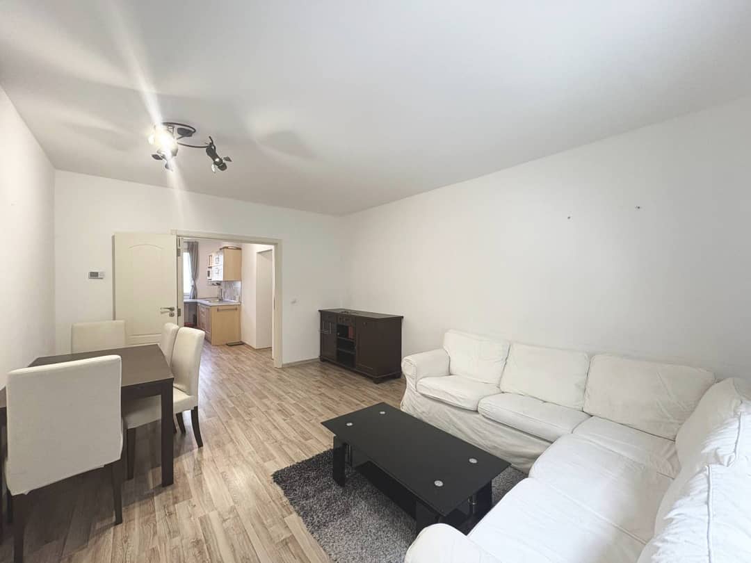 Raised ground floor apartment renovated with good transport links