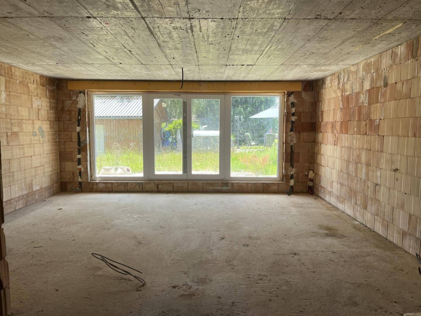 Rohbau-Doppelhaushälfte in Bruckmühl mit Garage & sonnigem Garten