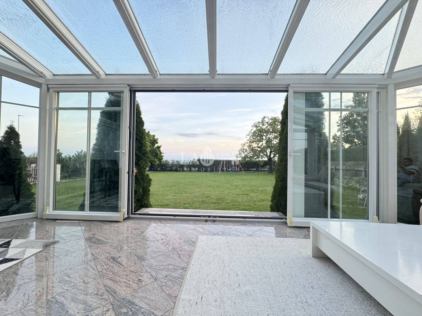 Mehrfamilienhaus in Kirchberg-Thening mit Garten & 3 Wohneinheiten