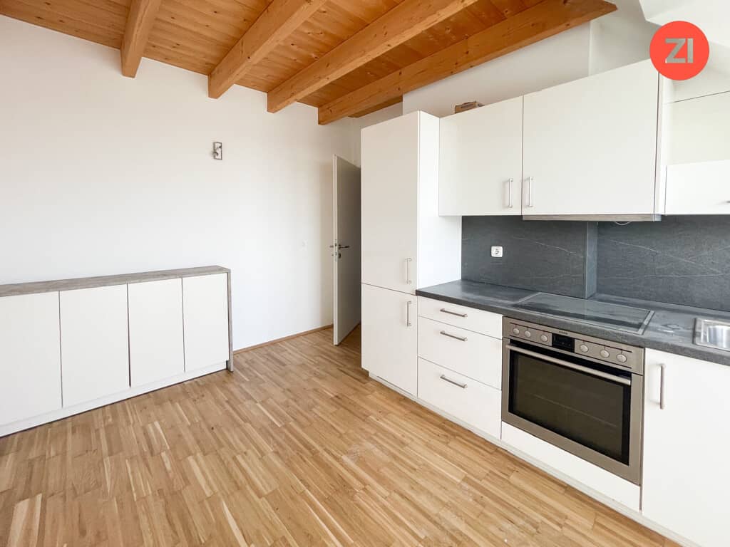 Attic apartment with modern kitchen and balcony