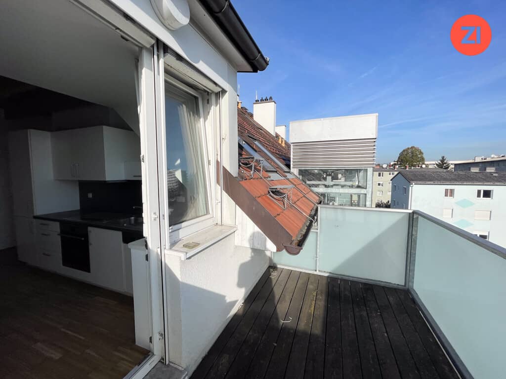 Attic apartment with modern kitchen and balcony