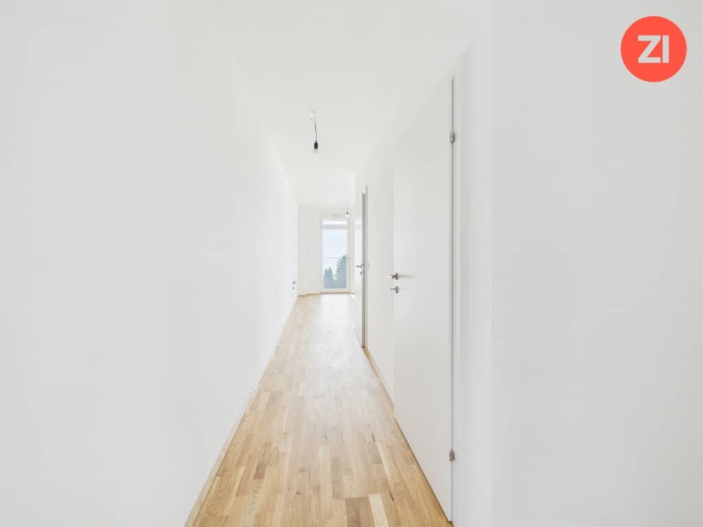 Apartment with balcony and brightly lit rooms