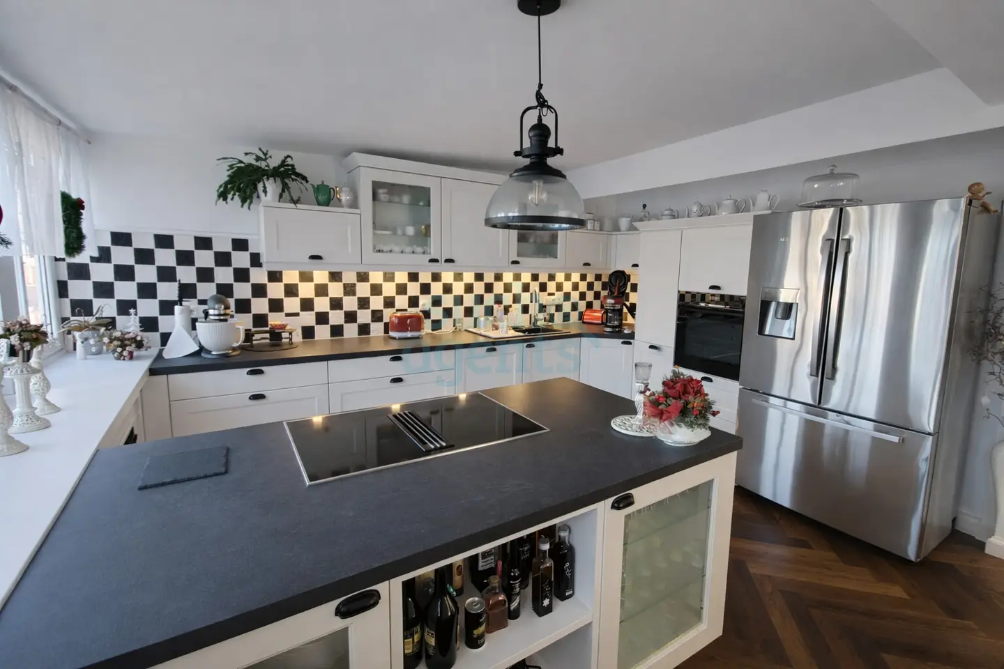 Attic apartment with roof terrace and herringbone parquet