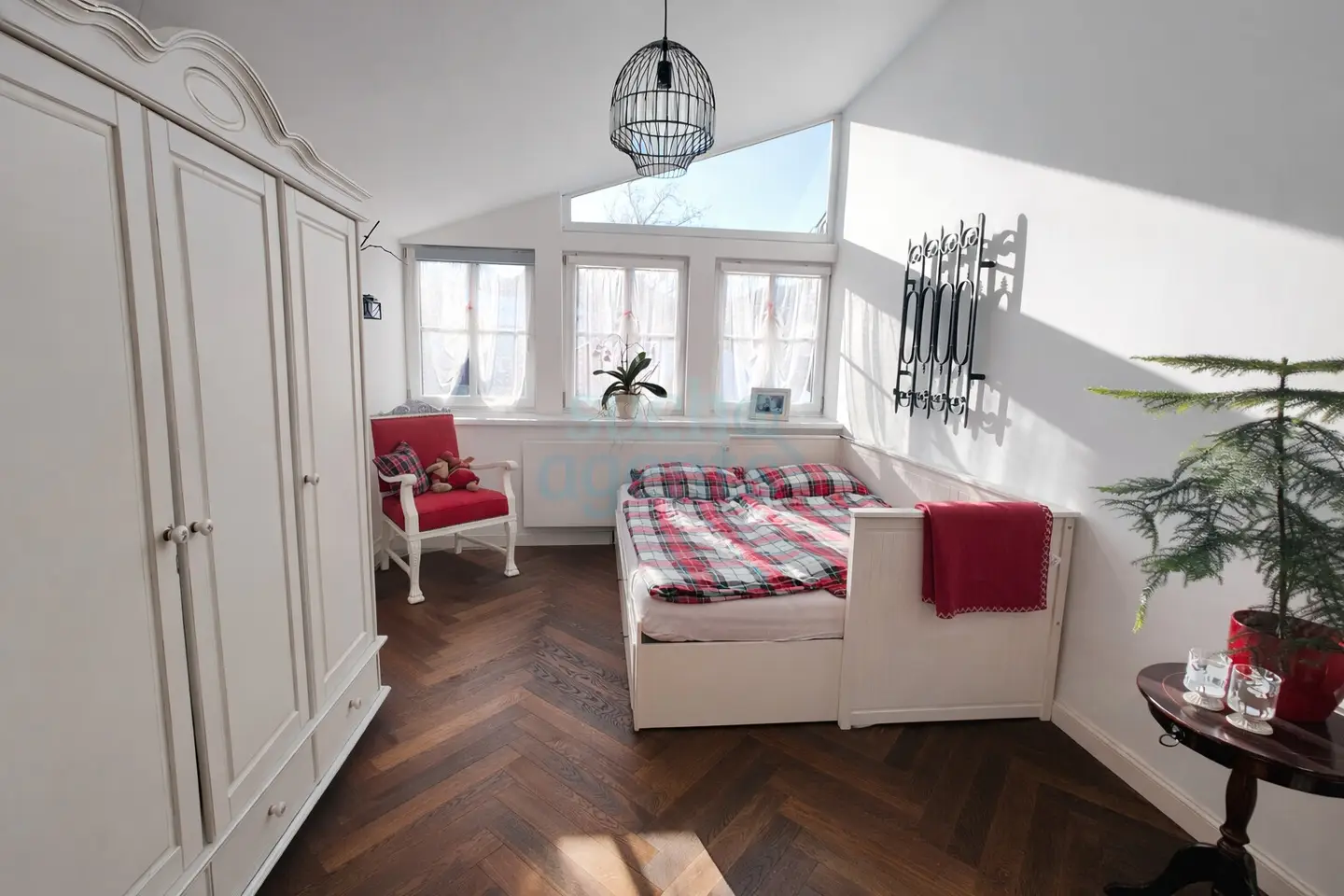 Attic apartment with roof terrace and herringbone parquet