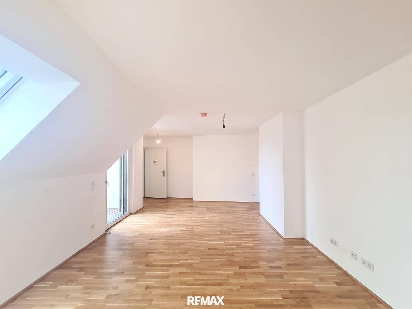 Dachgeschosswohnung Neubau mit hofseitigem Balkon