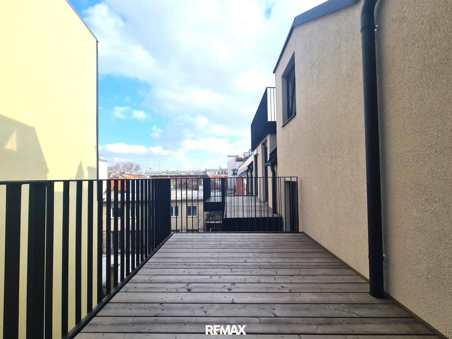 Dachgeschosswohnung Neubau mit hofseitigem Balkon