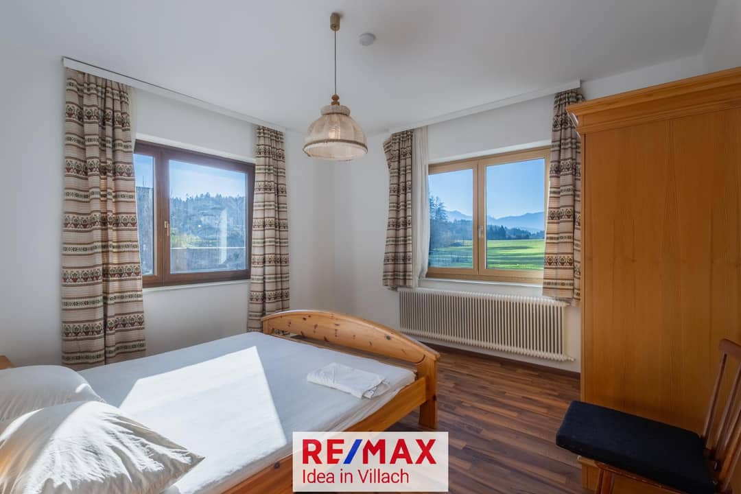 Kärntner Wohncharme in Seenähe – 5-Zimmer-Wohnung mit Kachelofen & Balkon