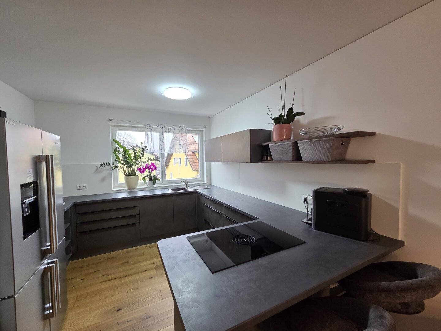 Wohnung mit Dachterrasse und eigenem Garten
