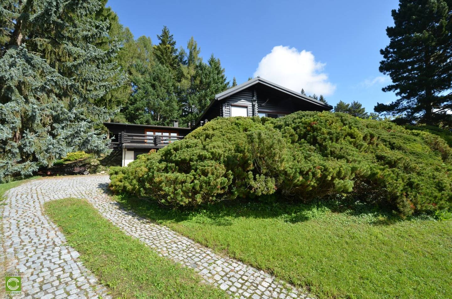 CHRISTOPH CHROMECEK IMMOBILIEN Sulz im Wienerwald Dream building plot with a log cabin in green peaceful location