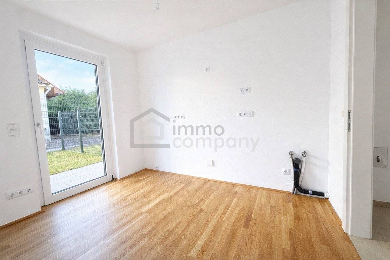 Erdgeschosswohnung Neubau mit eigenem Garten und Terrasse
