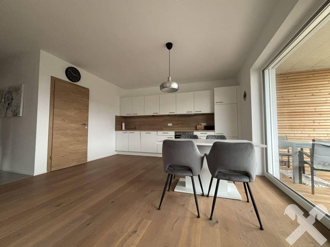 Modern apartment with balcony in four unit house