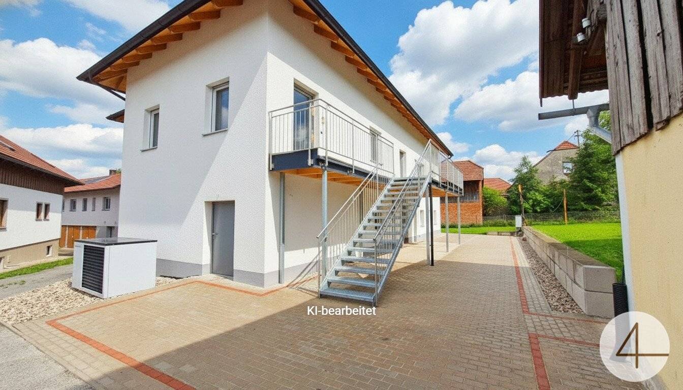 Dachgeschosswohnung mit eigenem Garten und großzügiger Raumaufteilung