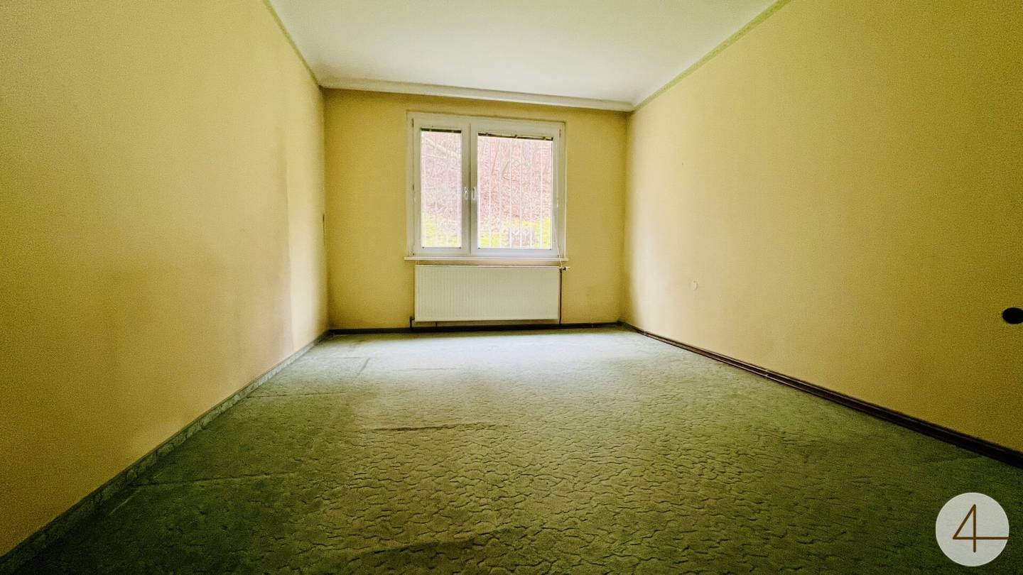 Wohnung mit Grünblick und Umbaupotenzial