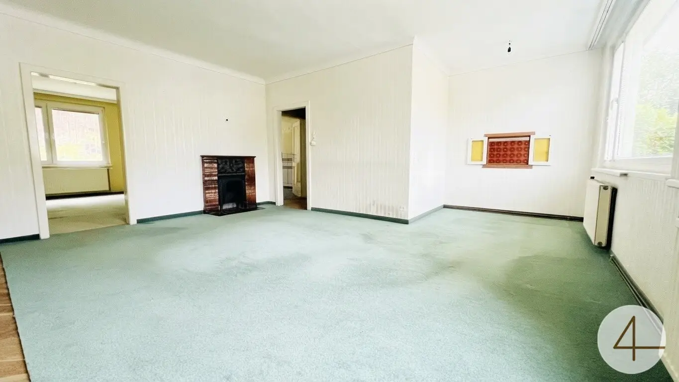 Wohnung mit Grünblick und Umbaupotenzial