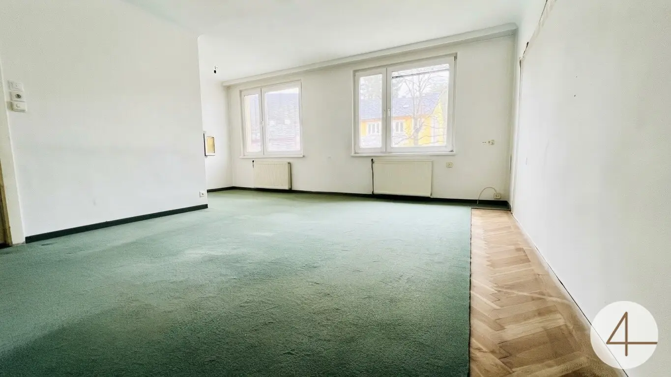 Wohnung mit Grünblick und Umbaupotenzial