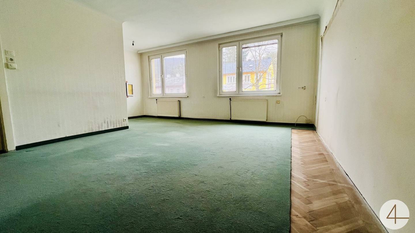 Wohnung mit Grünblick und Umbaupotenzial