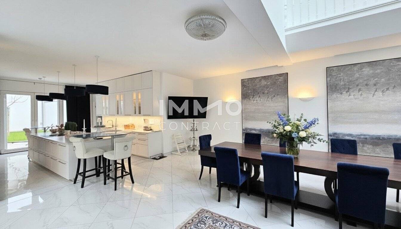 Zeitlose Architektur trifft Großzügigkeit - Designvilla mit Indoor-Pool und Einliegeroption