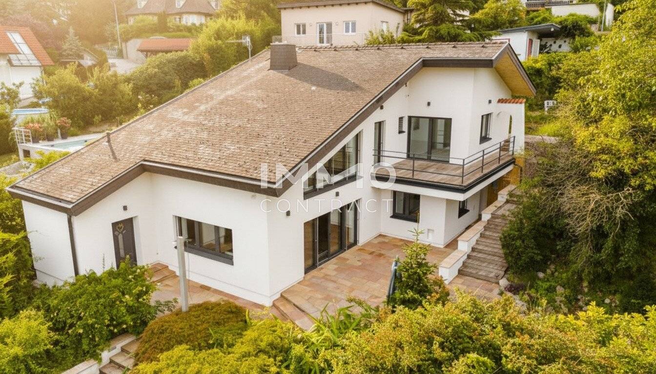 Exklusive Architektenvilla in Besthanglage mit Schwimmteich und Gästehaus