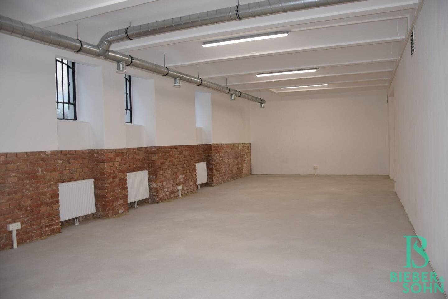 Representative, completely renovated basement loft, high-quality storage spaces