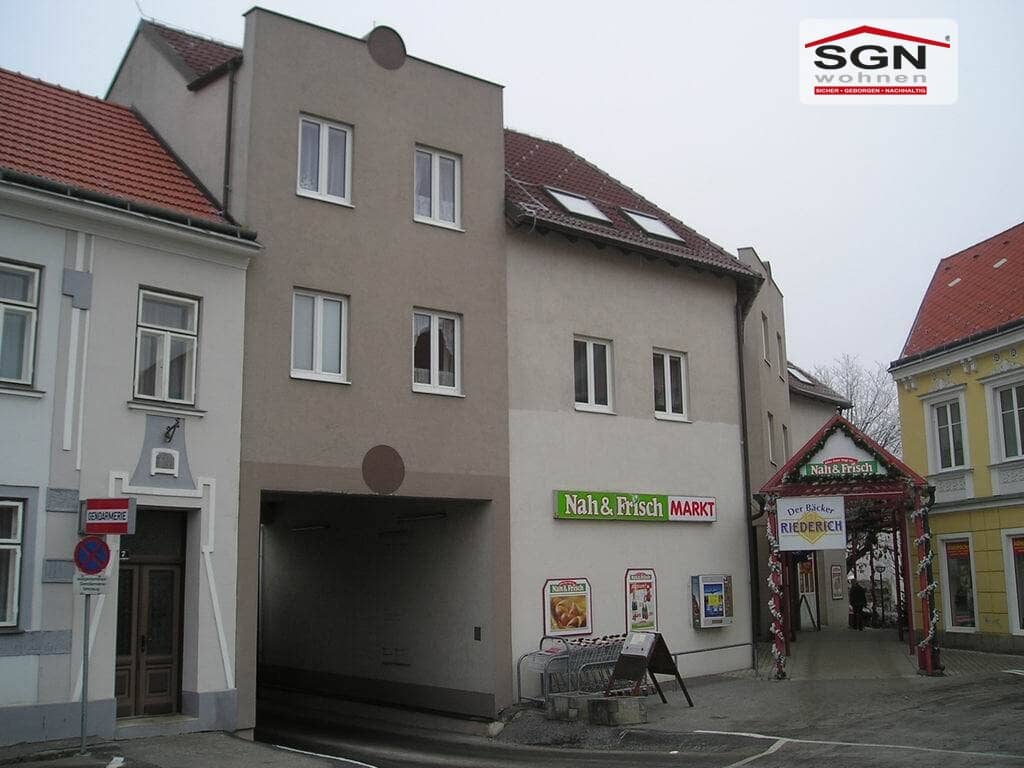 Attic apartment with storage room and parking space