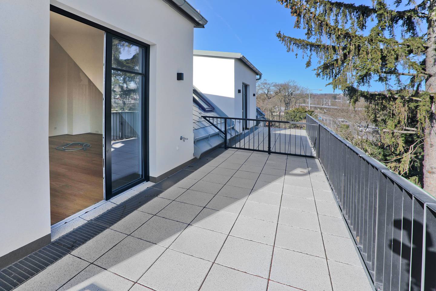 Attic apartment first occupancy balcony green view