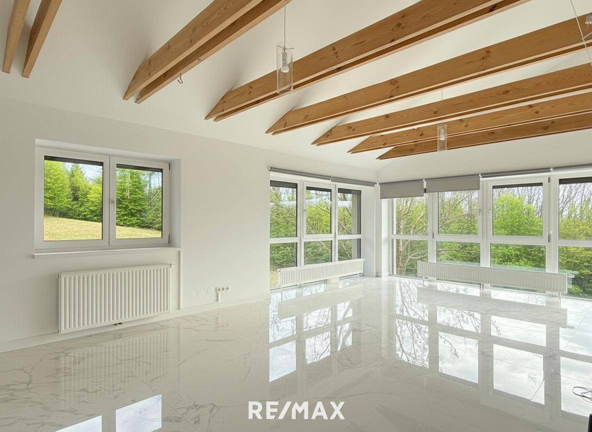 Dachgeschosswohnung mit Loggia und Garage
