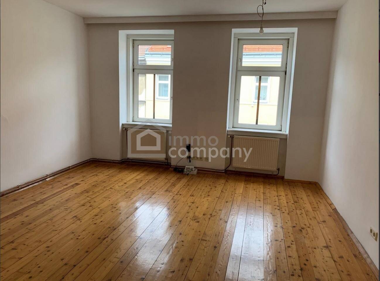 Sunny apartment with built in kitchen and storage room