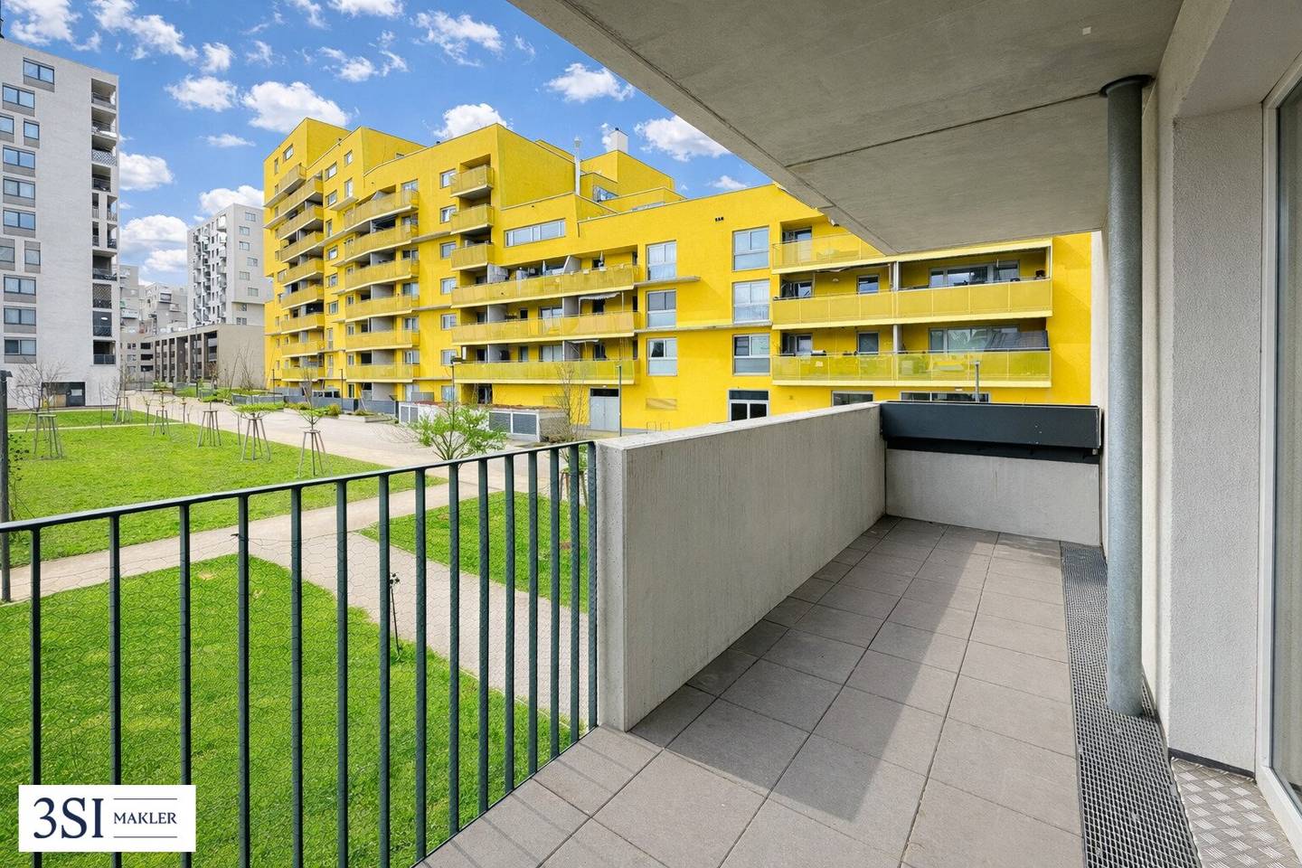 Apartment with balcony and garden view in green surroundings