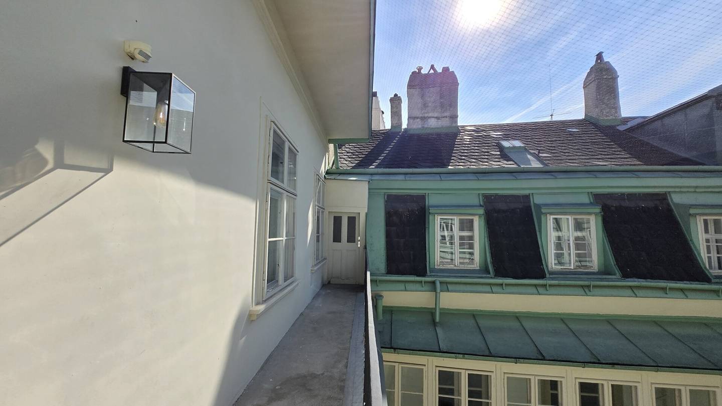 Apartment in central location with open kitchen and quiet courtyard