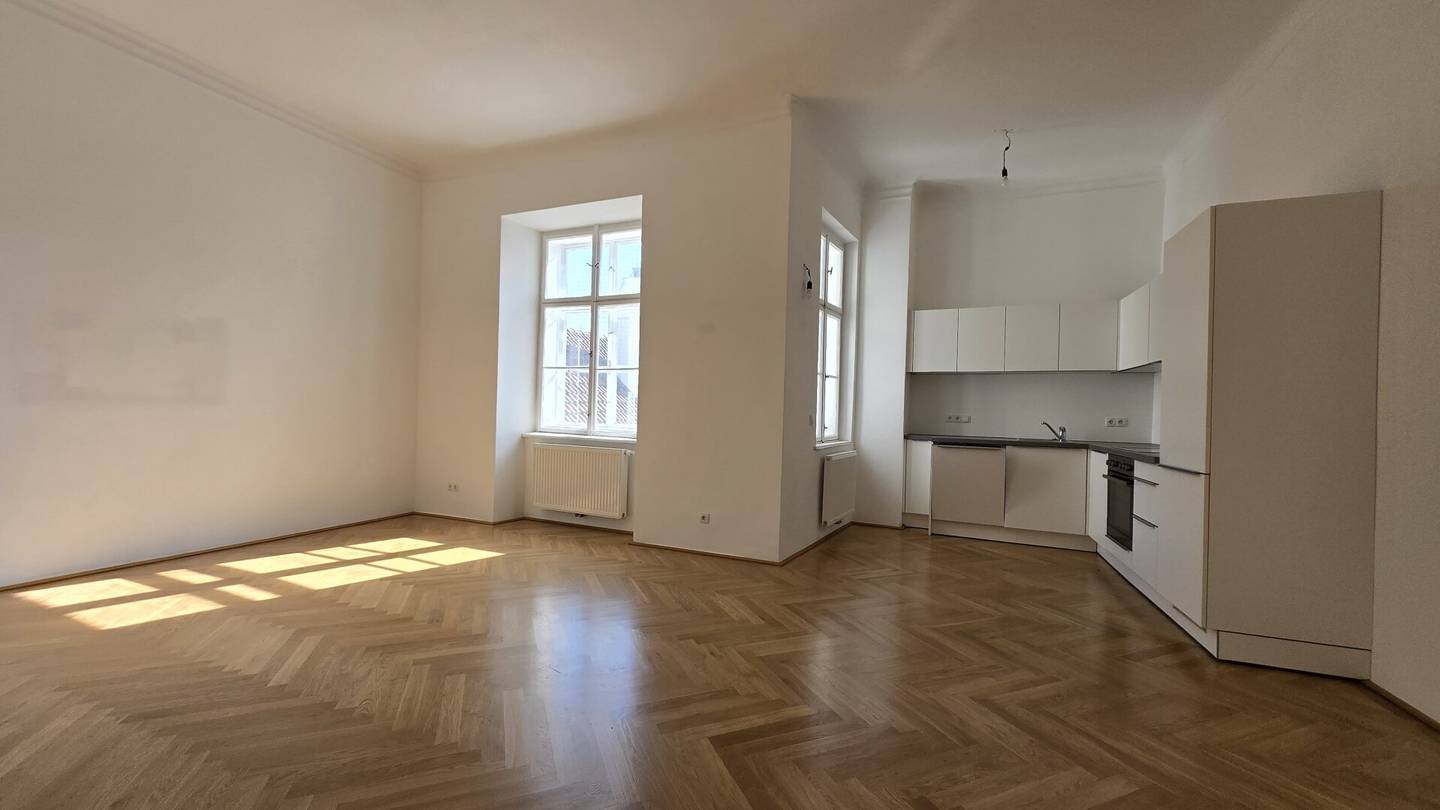 Apartment in central location with open kitchen and quiet courtyard