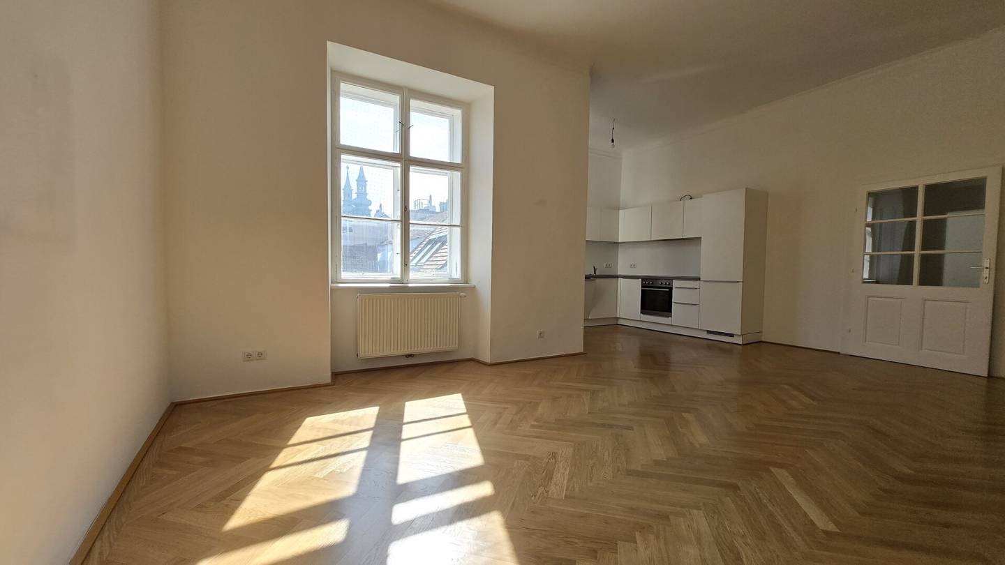Apartment in central location with open kitchen and quiet courtyard