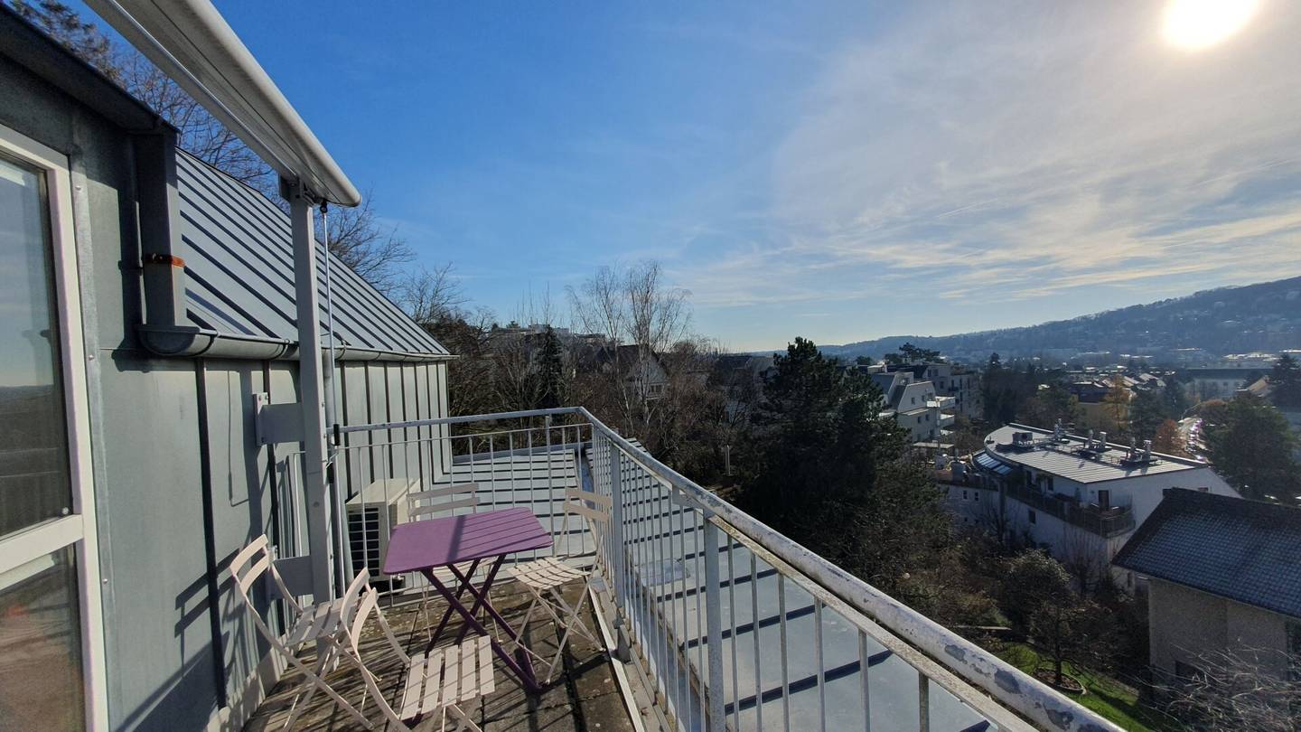 Dachgeschosswohnung mit Dachterrasse und Grünblick