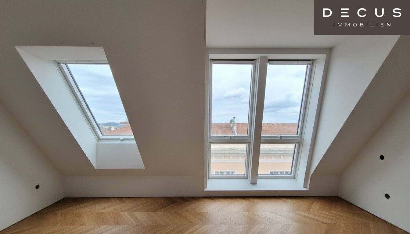 Dachgeschosswohnung mit Dachterrasse und Blick ins Stadtzentrum