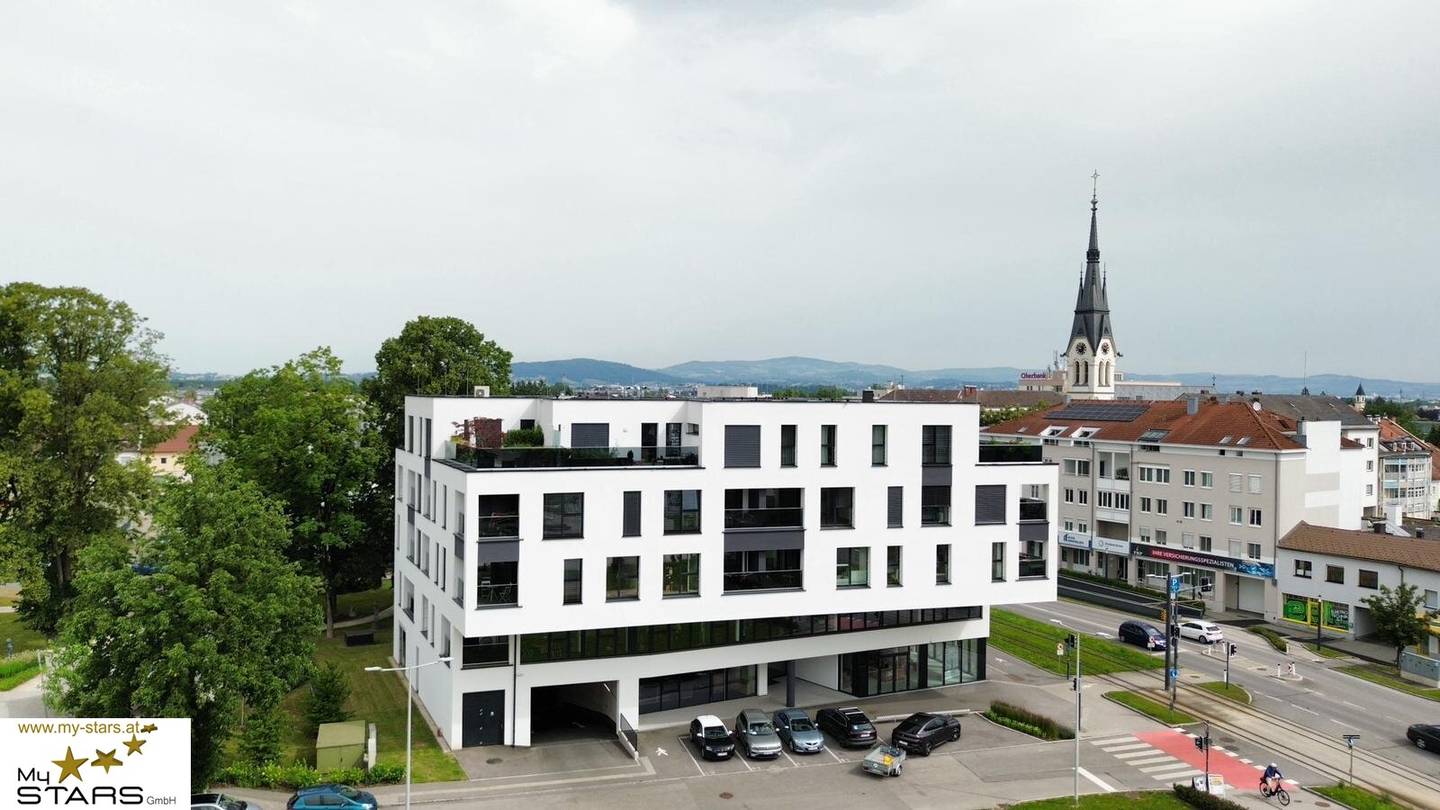 Neuer Kaufpreis: hochmoderne Loggia-Wohnung mit dem "Schloss Traun" vor der Haustüre